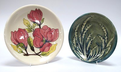 Lot 1053 - A Moorcroft Pottery Plate, of circular form,...