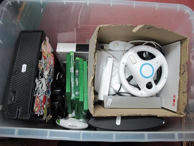 Lot 1044 - TV game consoles and accessories, including...