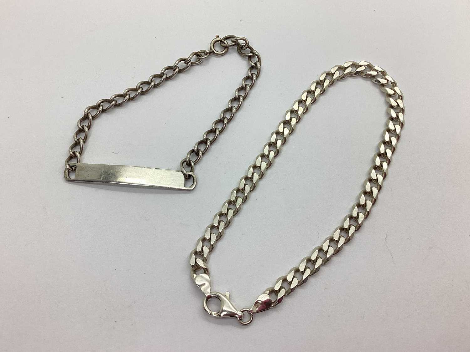 Lot 92 - A Hallmarked Silver Curb Link Bracelet,...