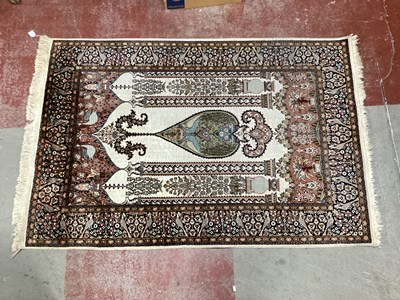 Lot 1526 - A Persian-style prayer rug with mihrab motif,...