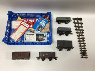 Lot 474 - Four O gauge wagons and a Peco wagon chassis...