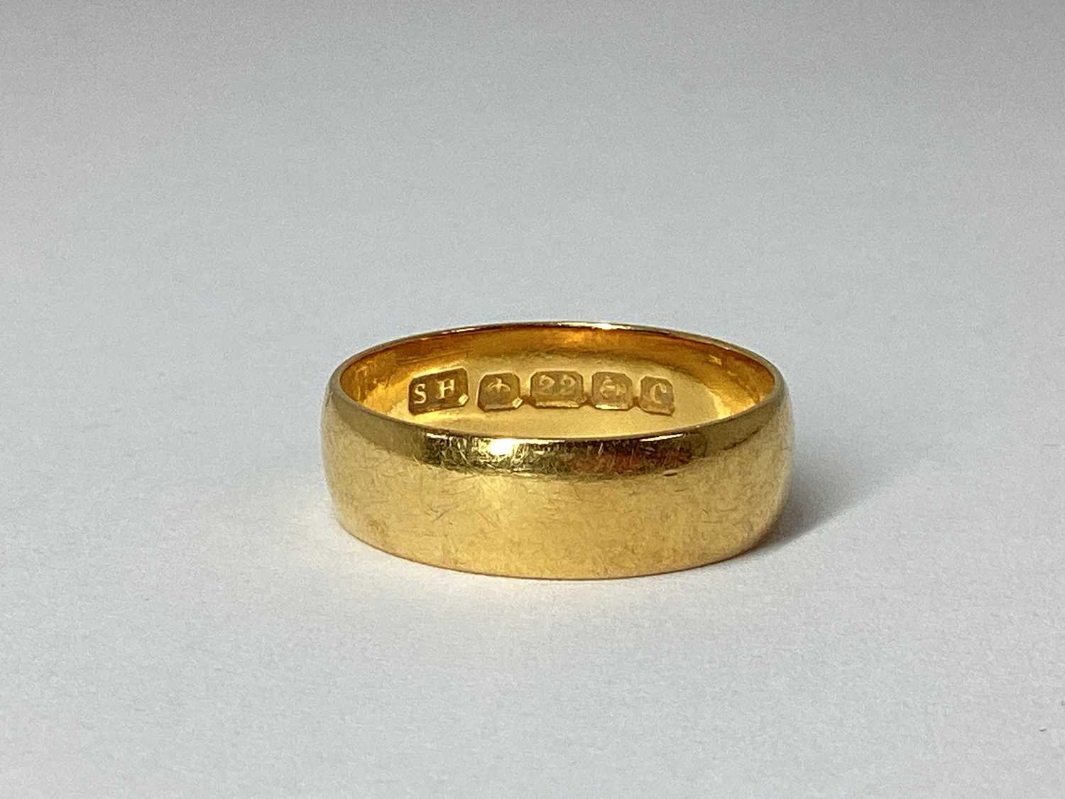 Lot 76 - A 22ct Plain Wedding Band (finger size P/Q).