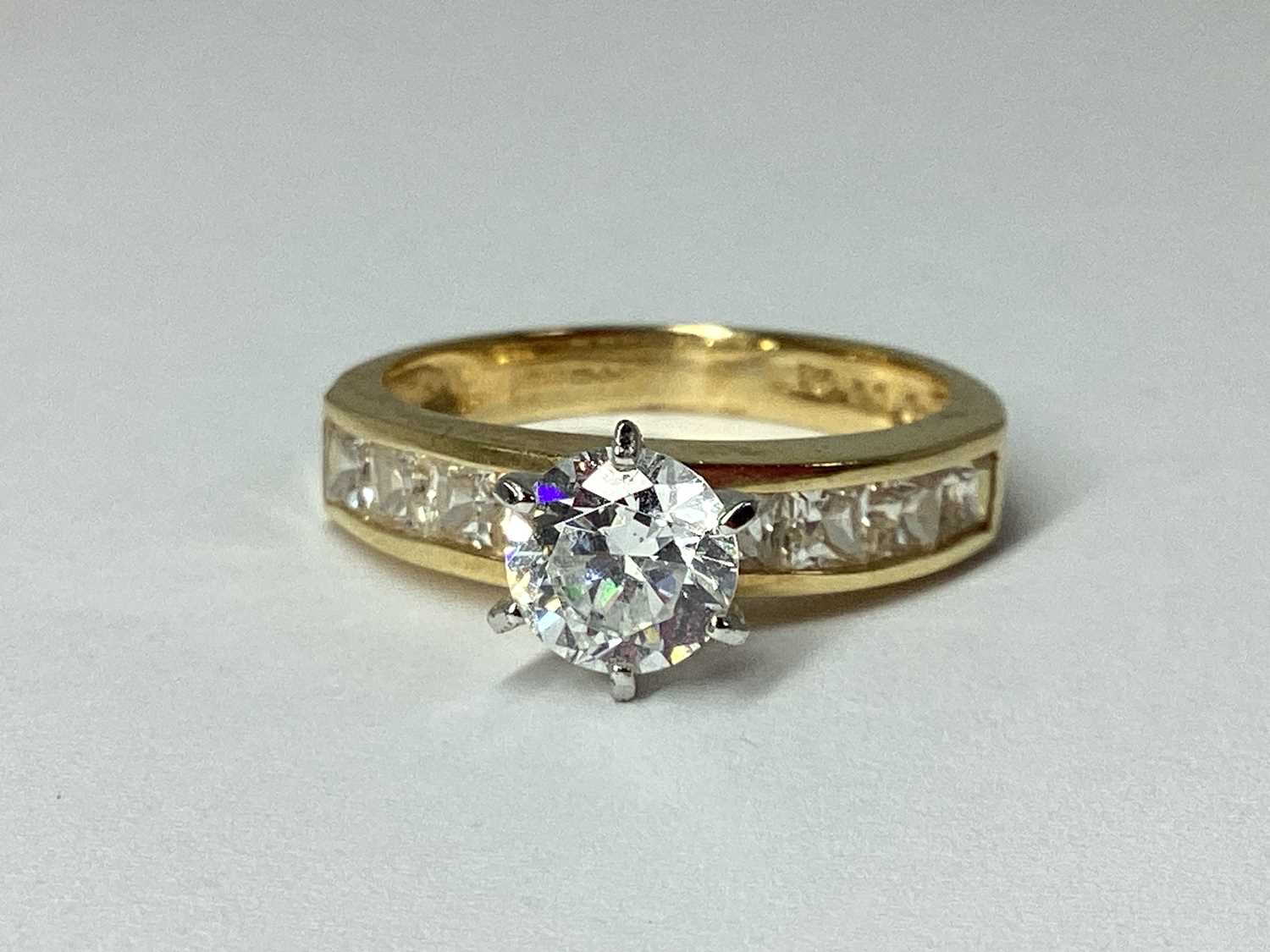 Lot 46 - QVC; A CZ Set Dress Ring, high claw set,...