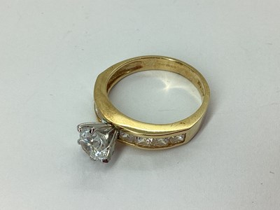 Lot 46 - QVC; A CZ Set Dress Ring, high claw set,...