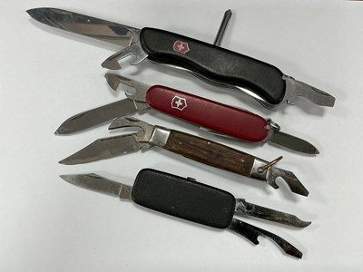 Lot 312 - Four Multi Tool Folding Pocket Knives,...