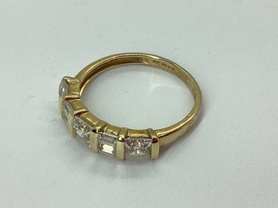 Lot 48 - QVC; A CZ Set Dress Ring, mixed cut, between...