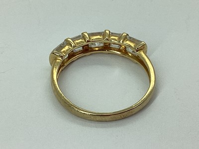 Lot 48 - QVC; A CZ Set Dress Ring, mixed cut, between...