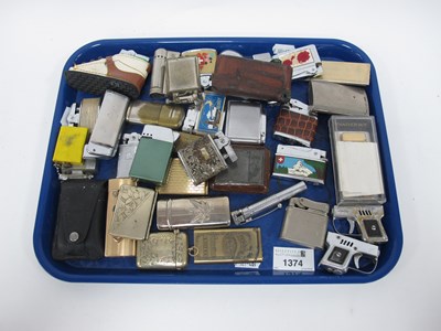 Lot 1374 - A large collection of lighters to include two...