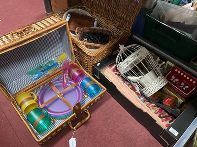 Lot 1123 - A picnic basket containing plastic plates,...