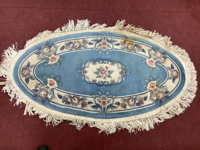 Lot 1505 - A Chinese 100% Wool Pile Rug of oval form...