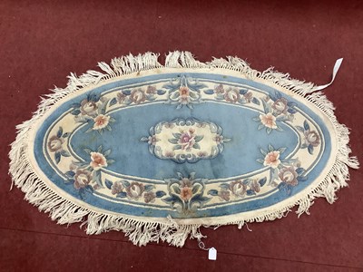 Lot 1539 - A Chinese 100% Wool Pile Rug of oval form...