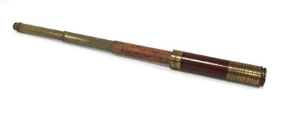 Lot 1306 - A three sectioned brass and wooden telescope...