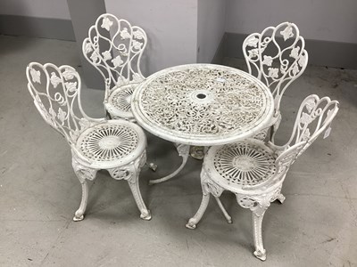 Lot 1514 - White Painted Metal Patio Table and Four Chairs.