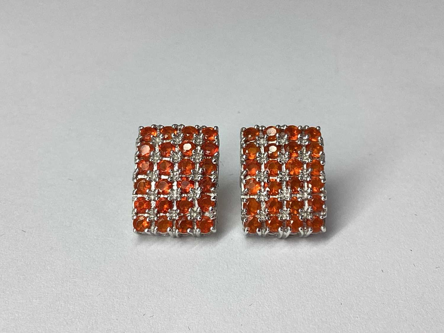 Lot 73 - A Pair of 9ct White Gold Rectangular Cluster...