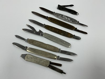 Lot 421 - Eight Vintage Advertising Folding Pocket...