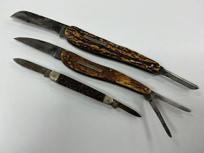 Lot 409 - Three Folding Pocket Knives, Buck and Ryan,...