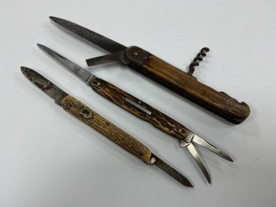Lot 404 - Three Folding Pocket Knives, K. Long and Co....