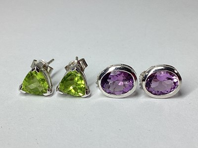 Lot 74 - A Pair of 9ct White Gold Oval Collet Set Stud...