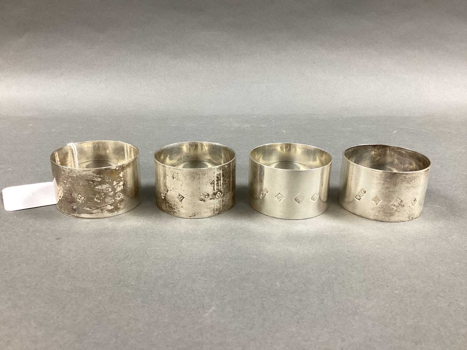 Lot 20 - A Set of Four Hallmarked Silver Napkin Rings,...