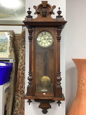 Lot 1481 - A large weight-driven wooden cased Vienna wall...