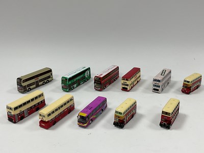 Lot 351 - Eleven N Scale Diecast model Buses by TINY,...