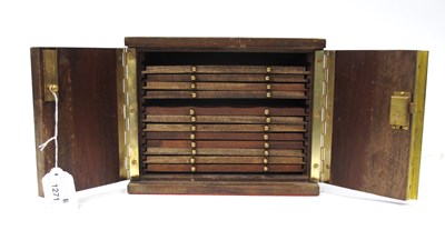 Lot 1390 - A vintage wooden coin cabinet by Peter Nichols,...