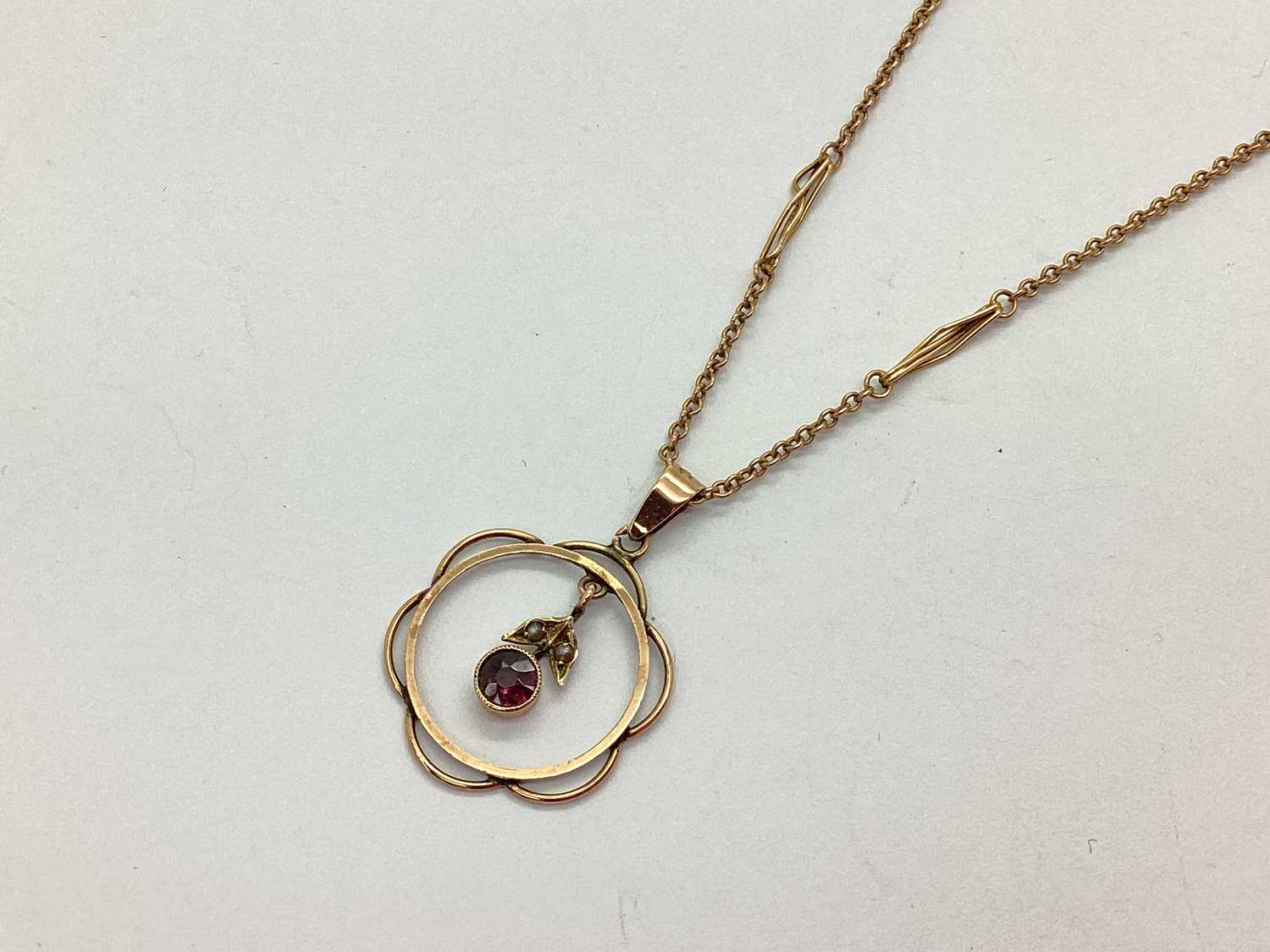 Lot 83 - An Edwardian Openwork Pendant, the dainty...