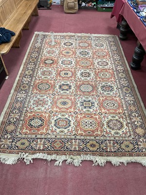 Lot 1480 - Floral Tassel Carpet with 28 central motifs on...