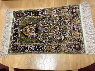 Lot 1532 - Pure Silk Hereke Tassel Rug, overall 77cm x 41cm.