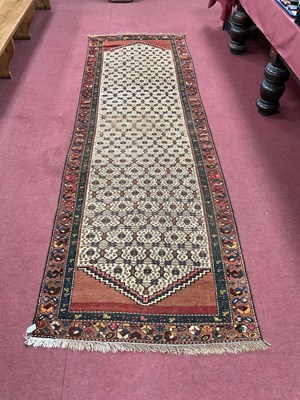 Lot 1476 - Antique Persian Wool Tassel Runner with...