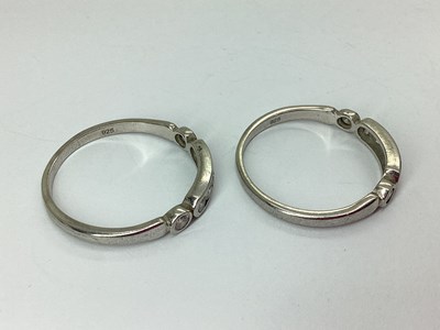 Lot 57 - Two Matching Round Brilliant Cut Diamond Rings,...