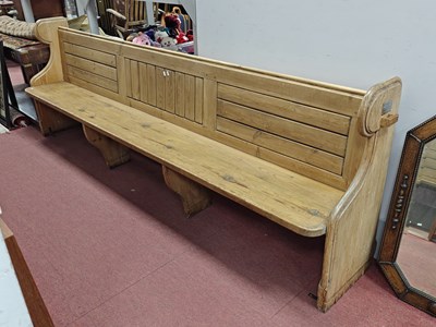 Lot 1472 - Pine Church Pew, with a panelled back, shaped...