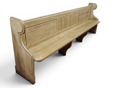 Lot 1468 - Pine Church Pew, with a panelled back, shaped...