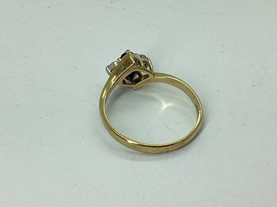 Lot 49 - A Dainty 9ct Gold Stone Set Twist Ring, the...