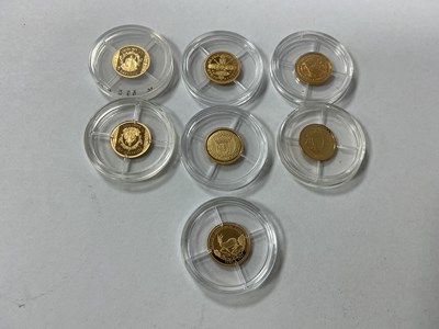 Lot 599 - Collection Of Seven Miniature Gold Proof Coins,...