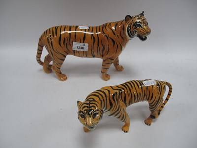 Lot 1236 - Two Beswick Porcelain Tiger Figures, heights...