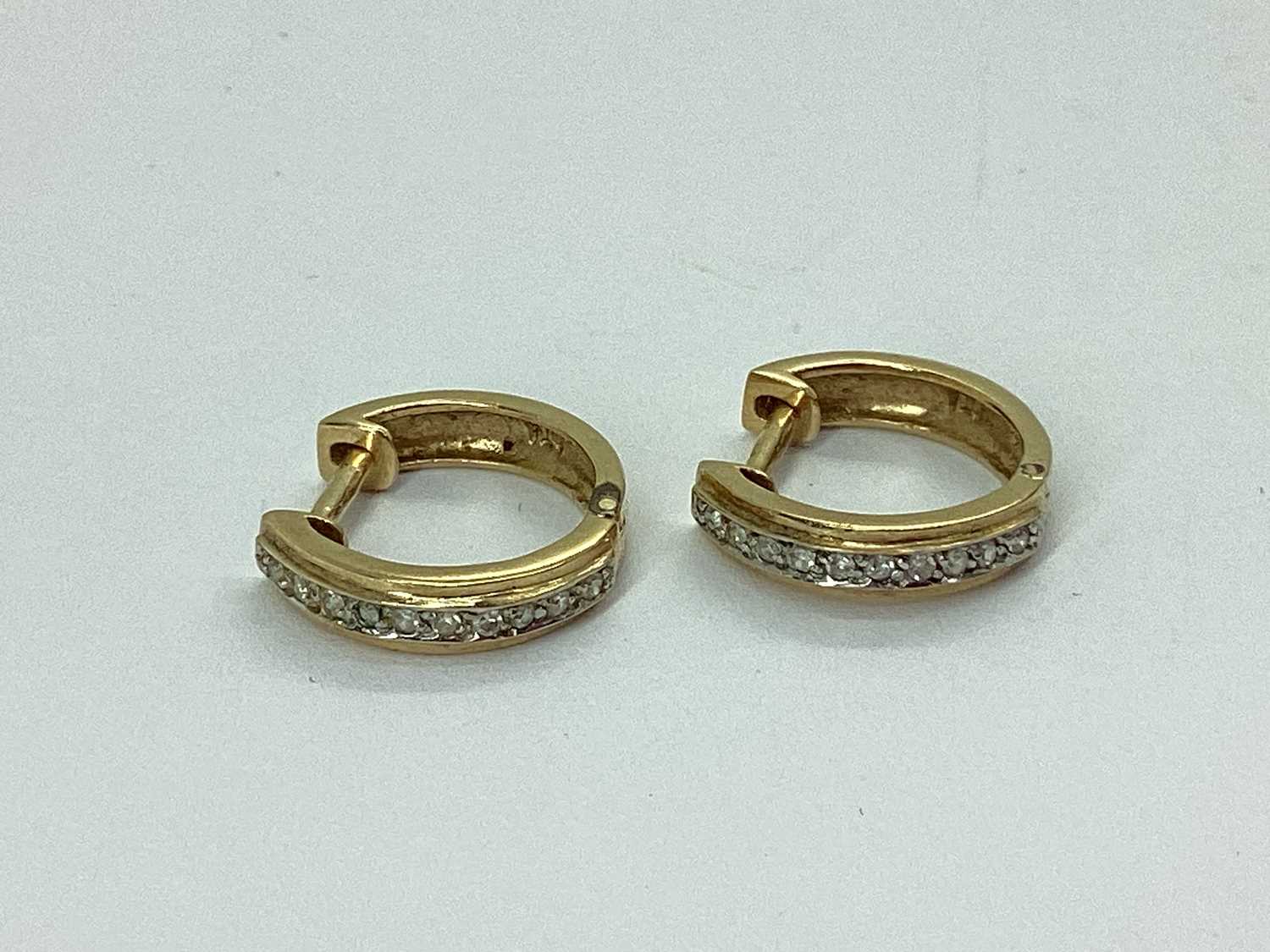 Lot 75 - A Pair of Dainty 9ct Gold Diamond Pavé Set...
