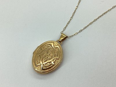 Lot 59 - A 9ct Gold Oval Celtic Style Locket, of...