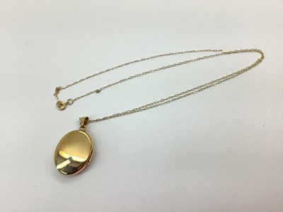 Lot 59 - A 9ct Gold Oval Celtic Style Locket, of...