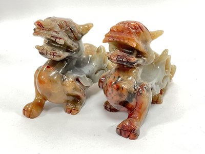 Lot 1264A - A pair of Oriental Carved Mineral Dogs of Foo...