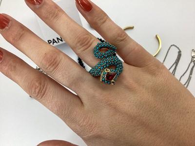 Lot 95 - Kenneth Jay Lane; A Decorative Serpent Ring,...