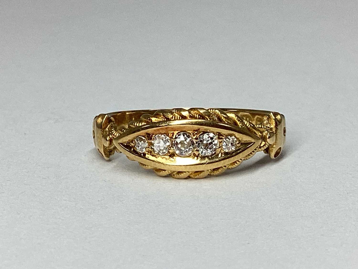 Lot 47 - An 18ct Gold Five Stone Diamond Boat Shape...
