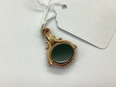 Lot 178 - An Oval Polished Hardstone Locket, in the form...