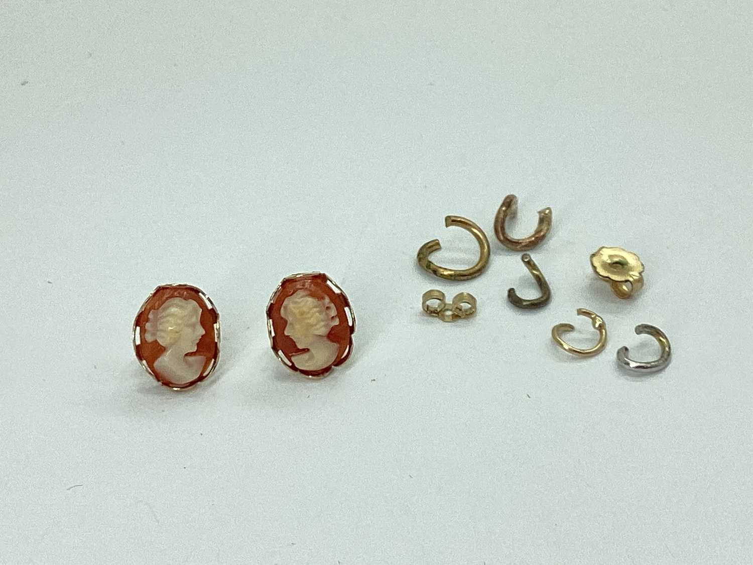 Lot 80 - A Dainty Pair of 9ct Gold Oval Shell Carved...
