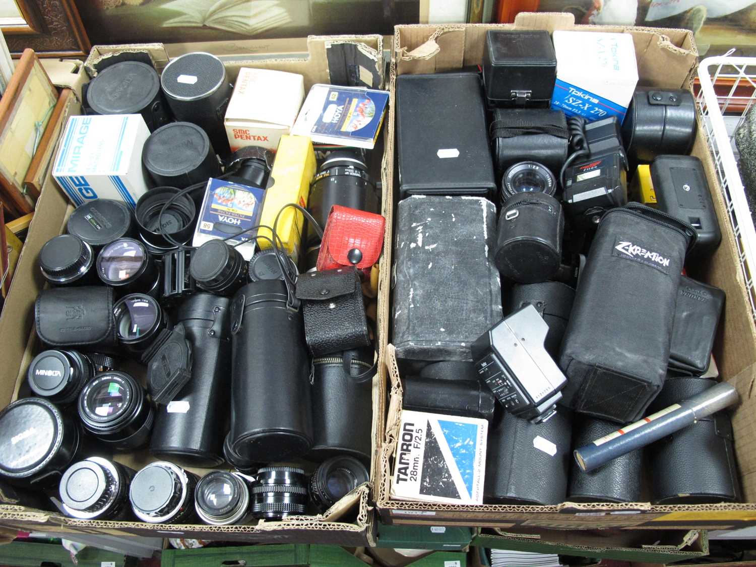 Lot 1014 - Camera lenses and accessories, including...