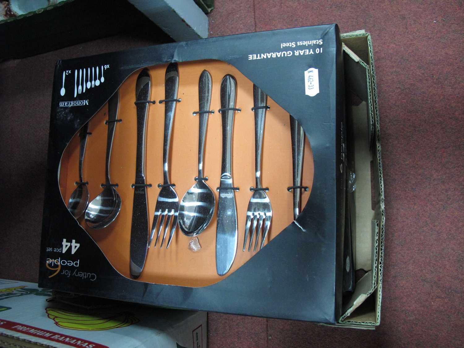Lot 1080 - Three boxed Monogram 44-piece stainless steel...