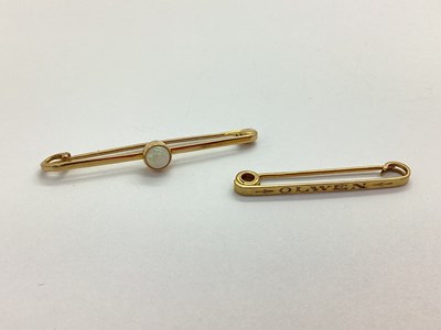 Lot 68 - A Cabochon Set Stock Pin, indistinctly stamped...