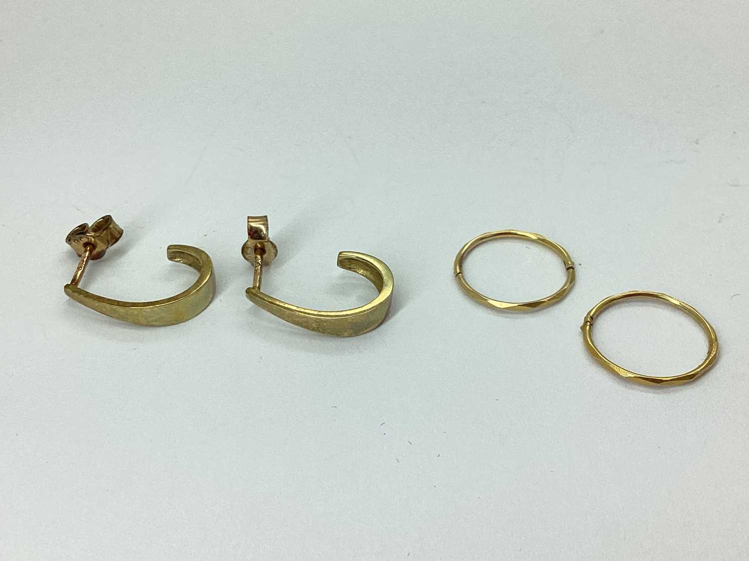 Lot 81 - A Pair of Plain Half Hoop Earrings, of tapered...