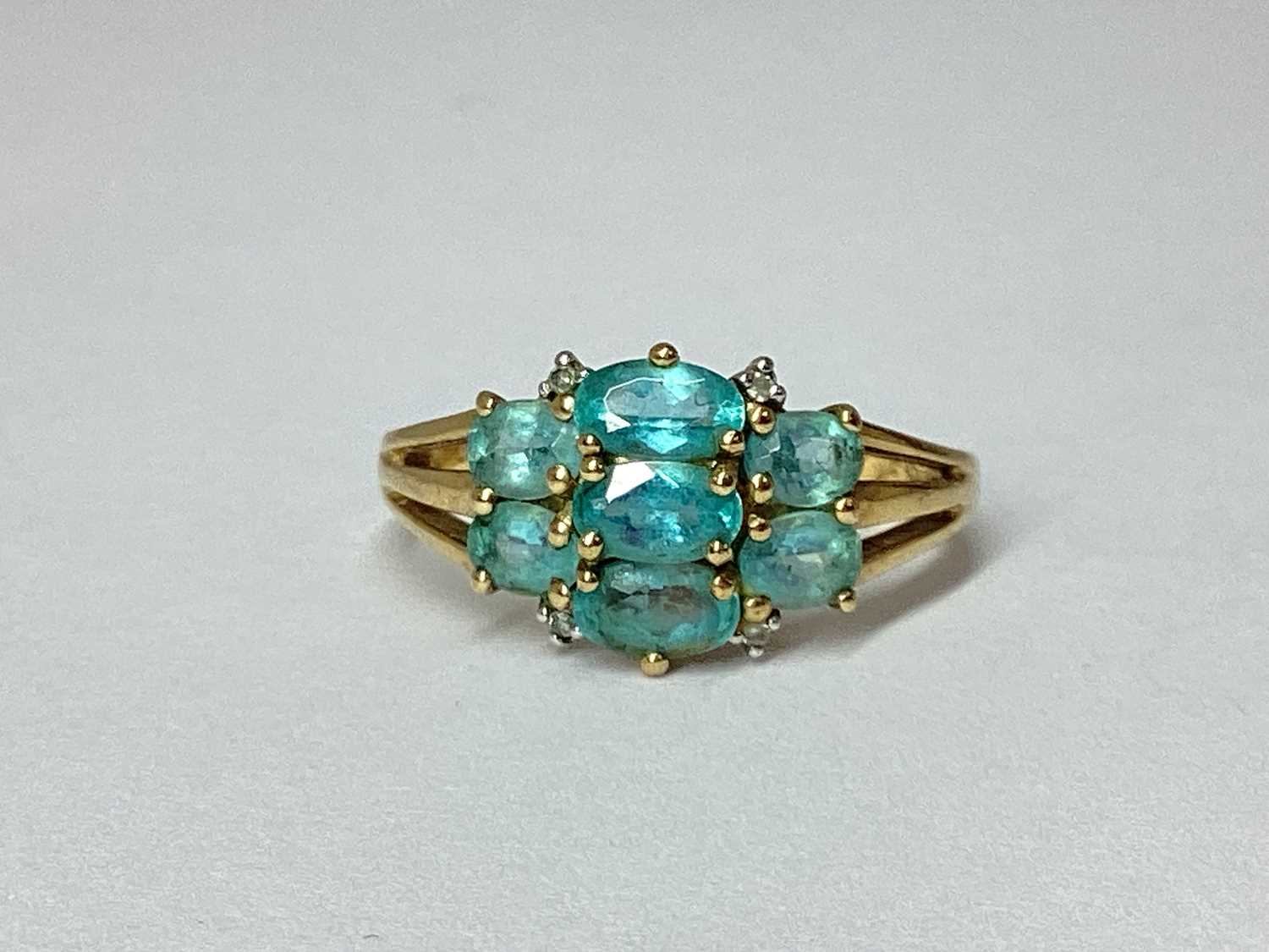 Lot 56 - QVC; A 9ct Gold Claw Set Cluster Ring, the...