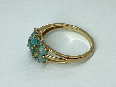 Lot 56 - QVC; A 9ct Gold Claw Set Cluster Ring, the...